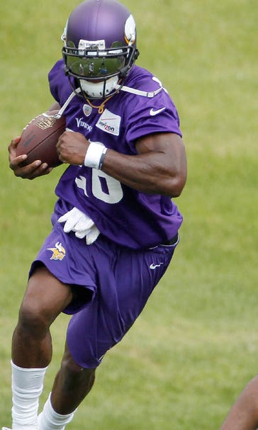 Peterson back with Vikings but normalcy still awaits